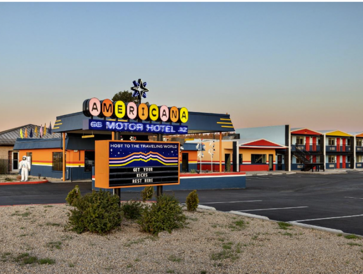 The Americana Motor Hotel sign with colorful typography.